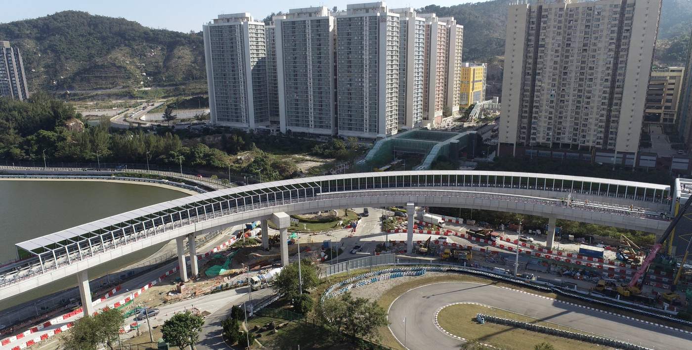 Aerial view of an elevated bridge fitted with metal noise barrier panels