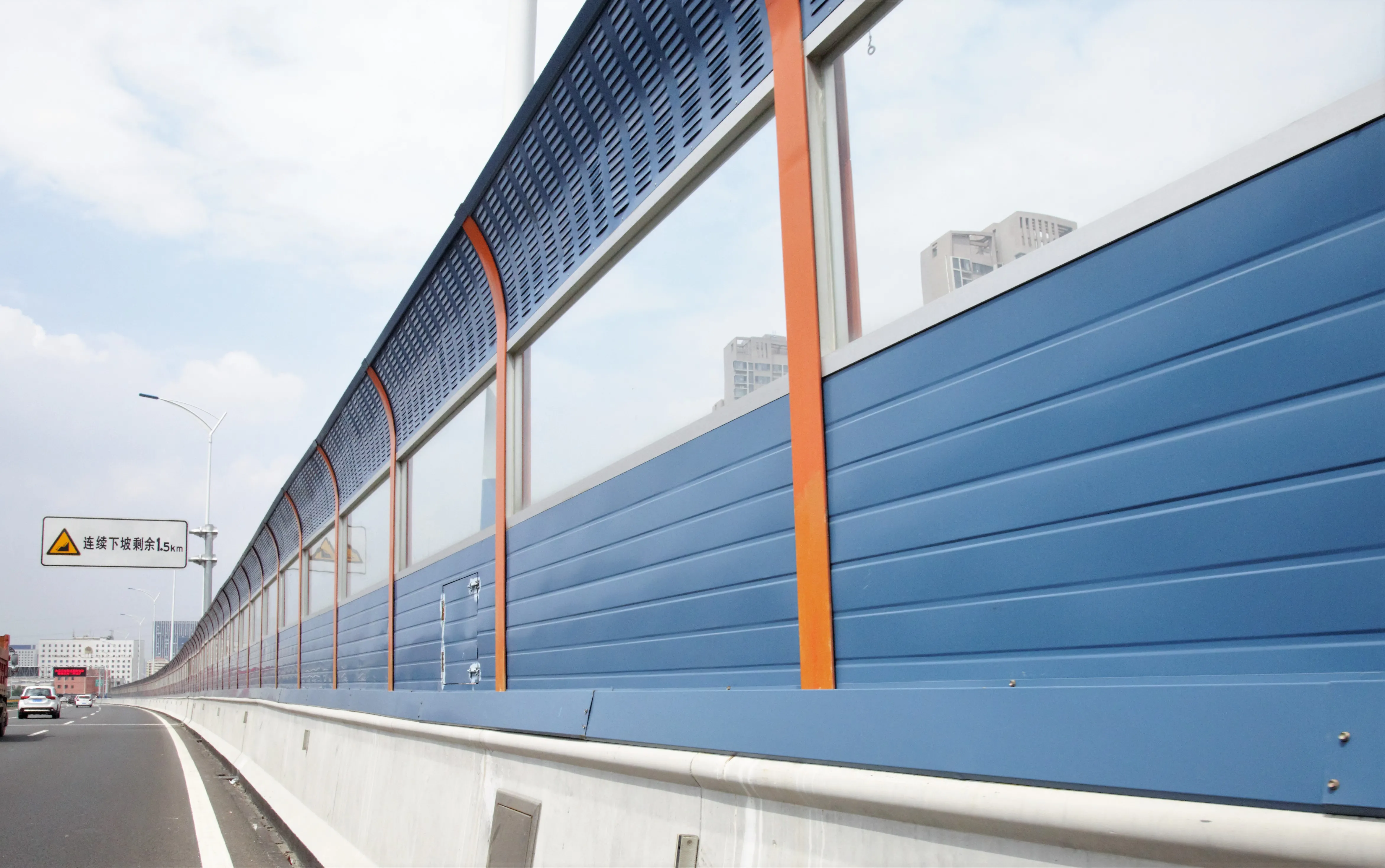 How do the standards and regulations for noise barrier construction differ across regions?