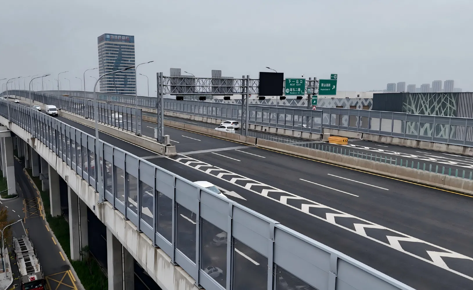 Bridge noise barrier installed along a busy motorway