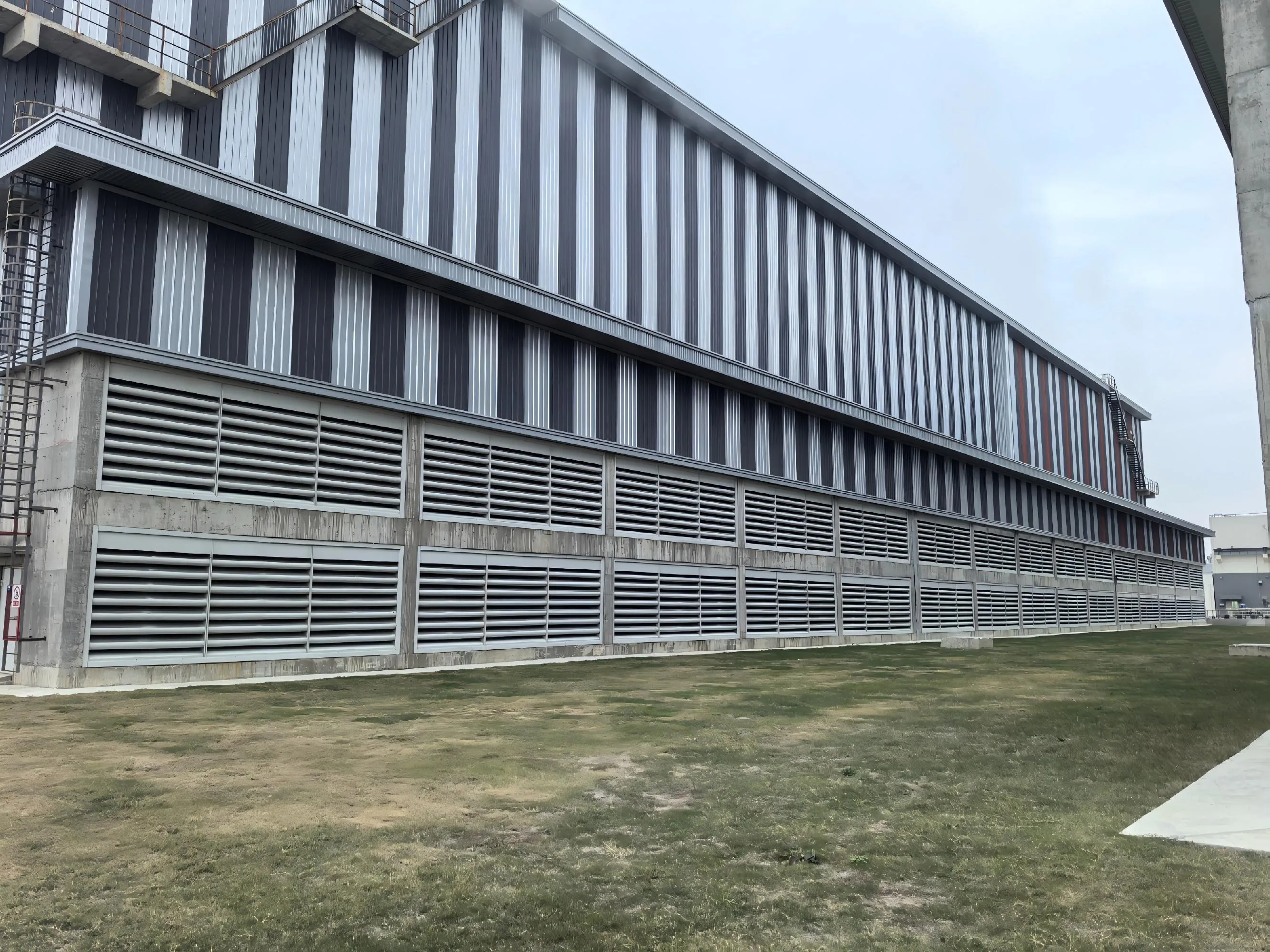 Highway noise barrier installed along a busy motorway