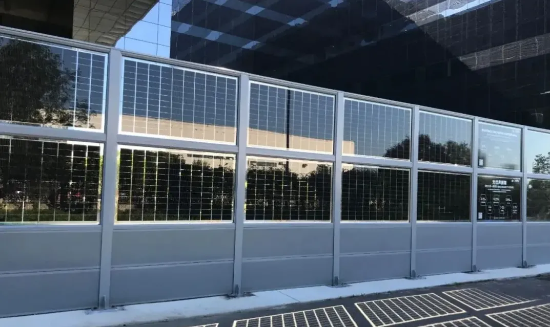 Highway noise barrier installed along a busy motorway