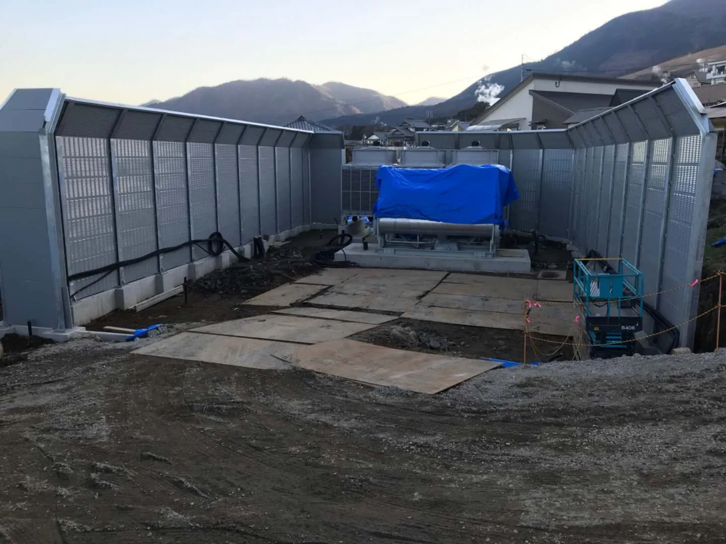 Highway noise barrier installed along a busy motorway