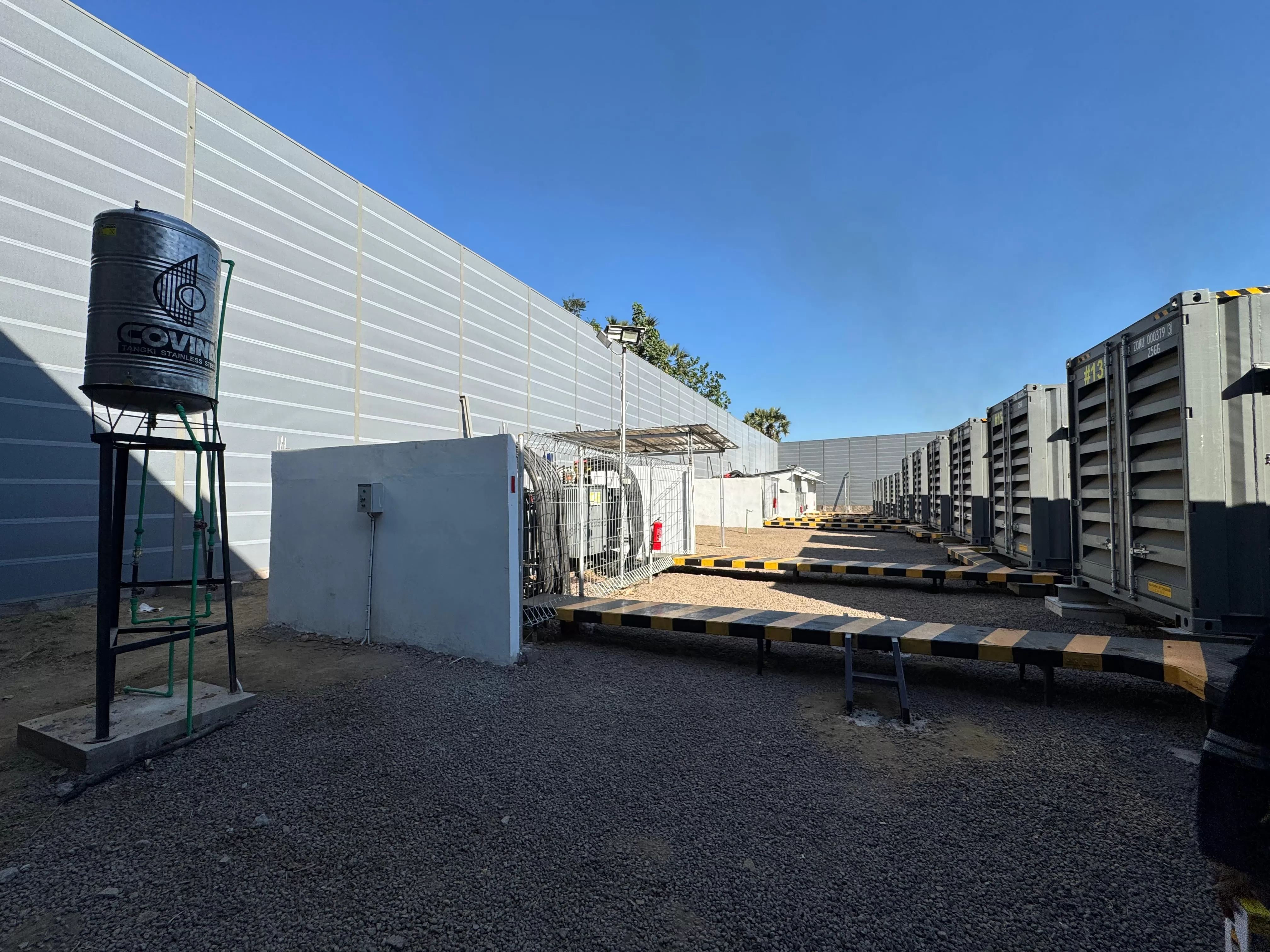 Micro-perforated metal acoustic panels installed around power generation equipment